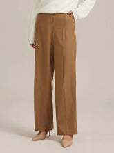 a woman in woolen culottes pants